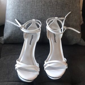 White and silver high heels never worn